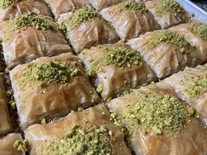 Close-up of baklava topped with ground pistachios.