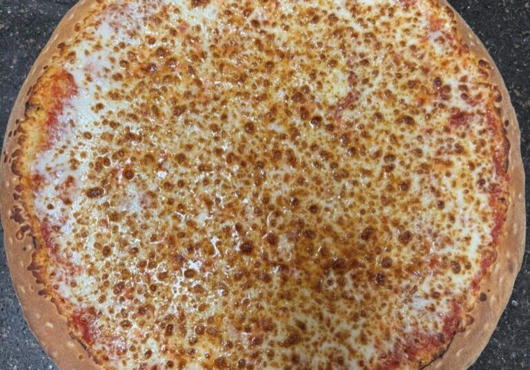 A whole cheese pizza with a golden-brown crust.
